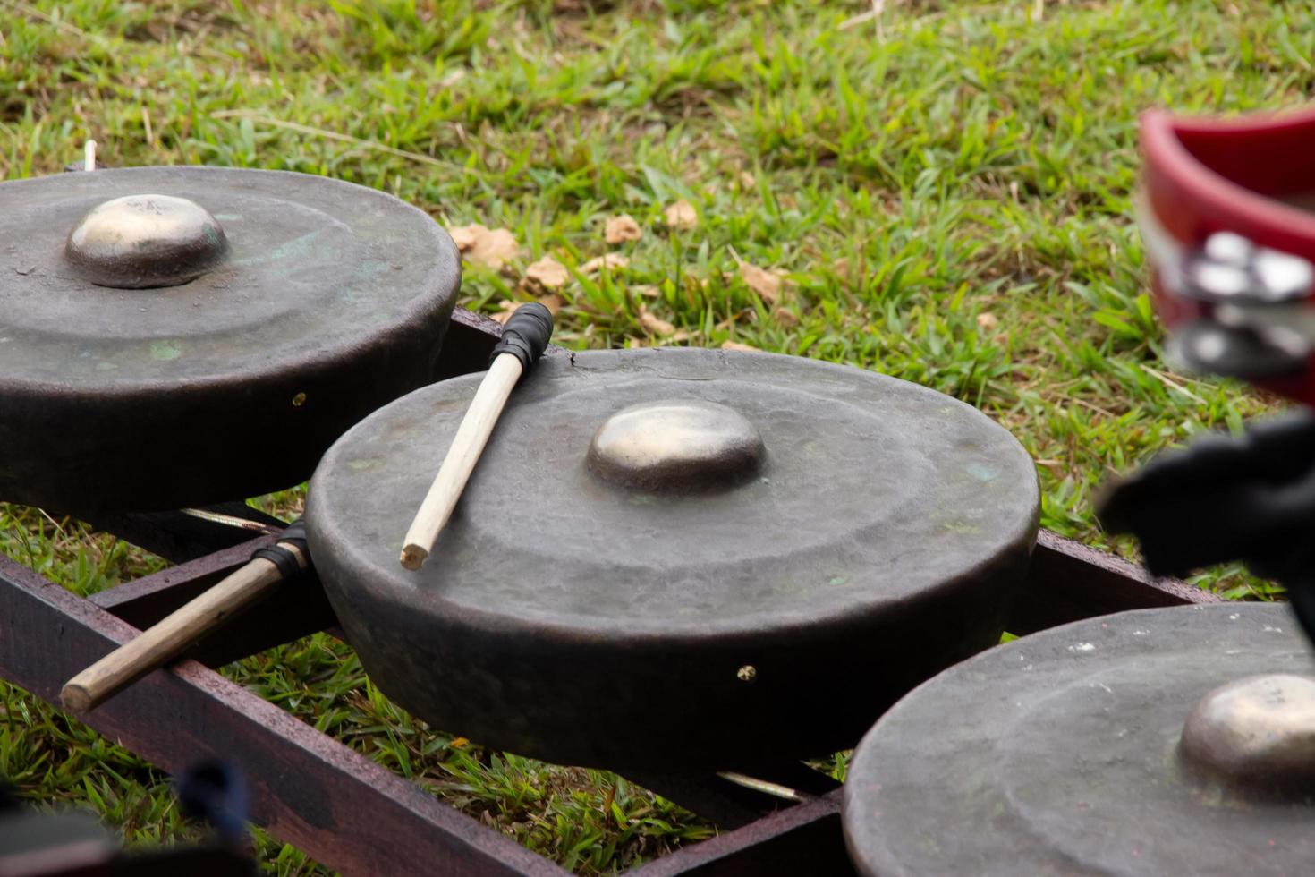 gamelan on a green grass background at a celebration event photo