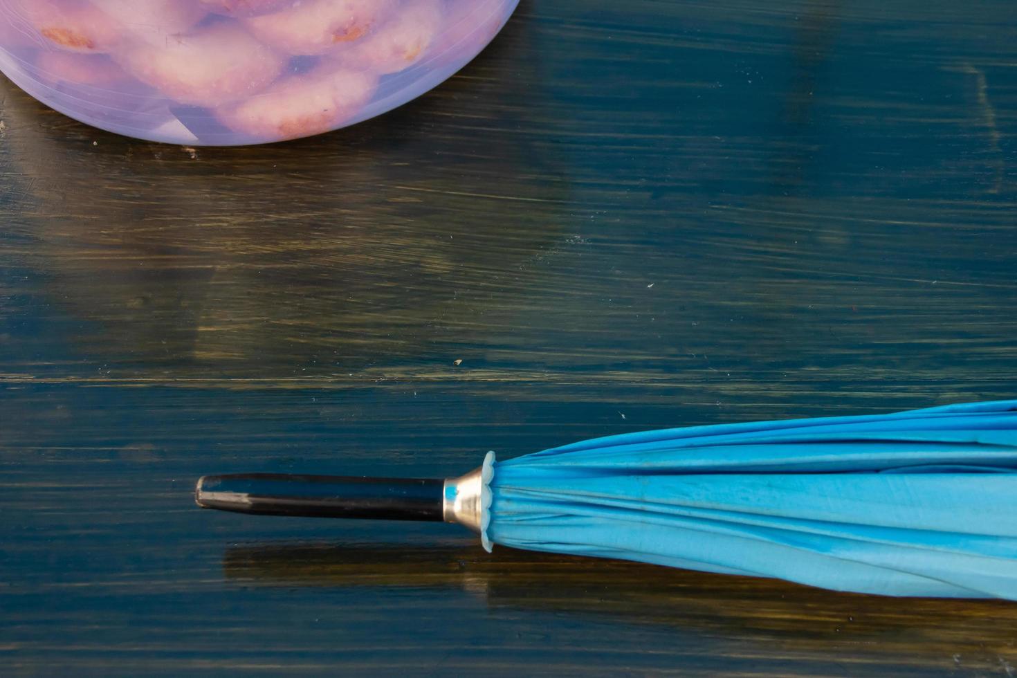 brown umbrella and table, for rainy season background photo