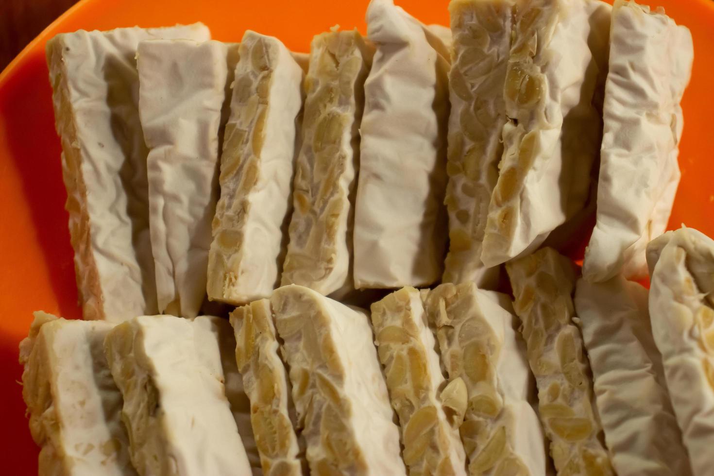 tempeh in a plastic container that is placed on the table photo