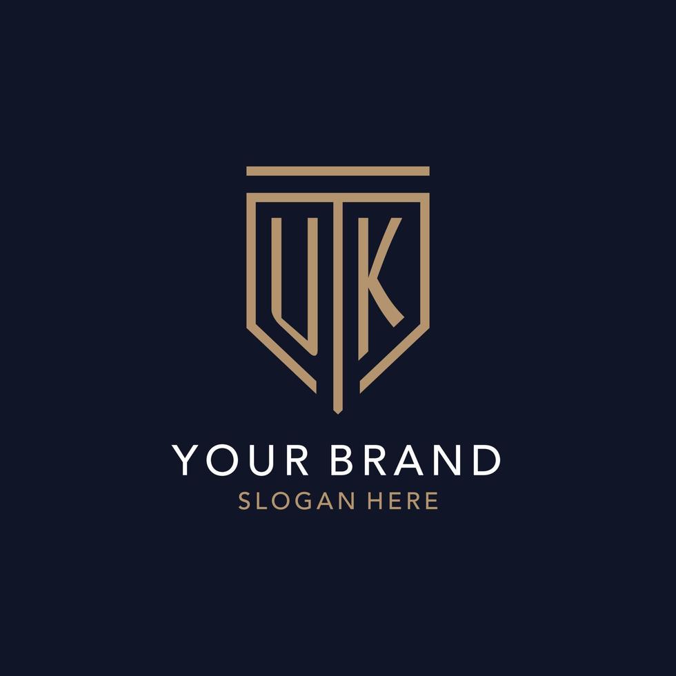 UK initial logo monogram with simple luxury shield icon design vector
