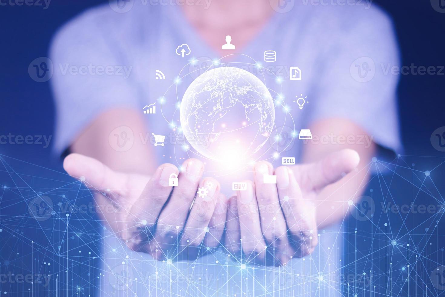 Hand holding virtual Global Internet connection metaverse. Business global internet connection application technology and digital marketing, Financial and banking, Digital link tech, big data. photo