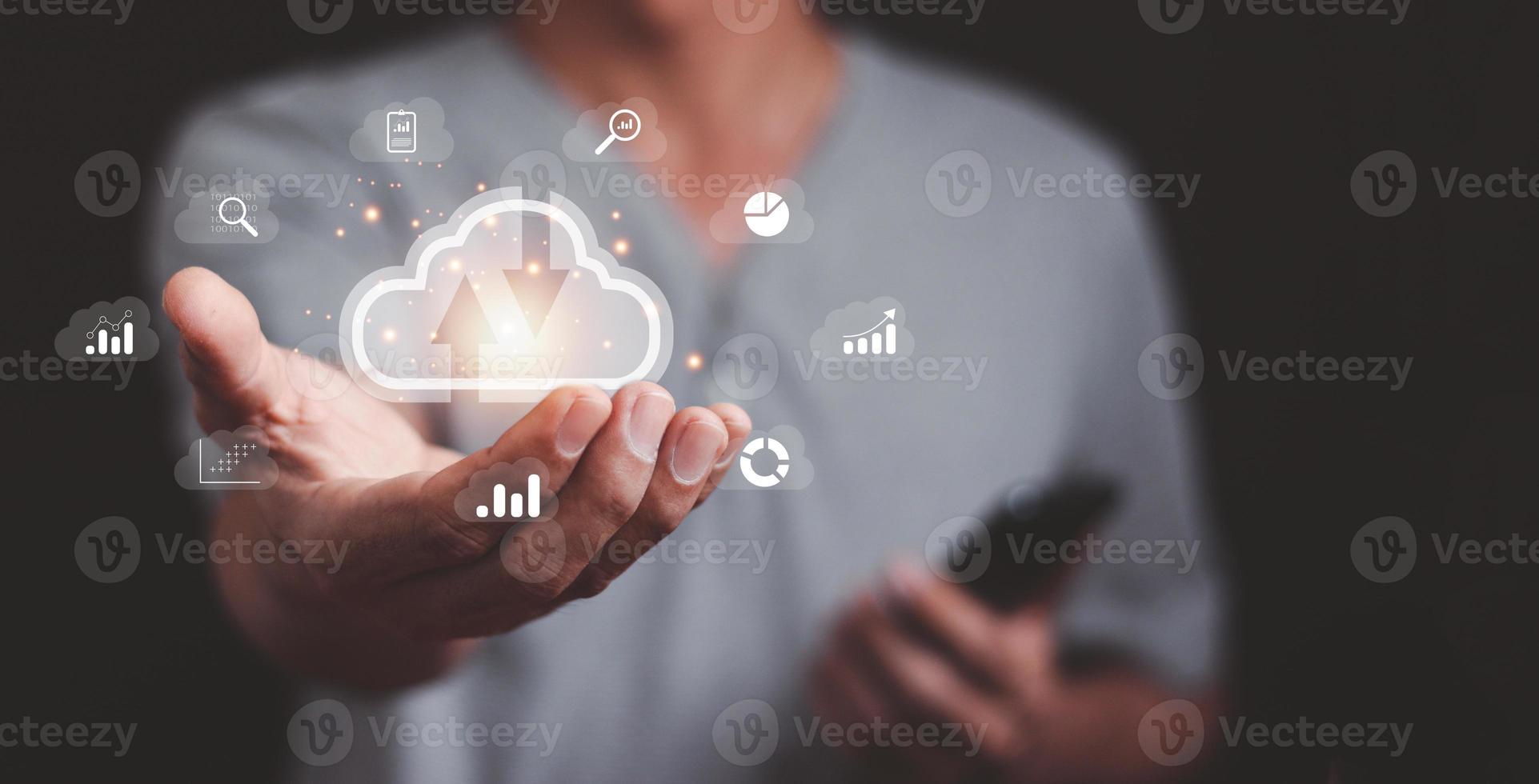 Big data analytics and business intelligence concept with chart and graph icons on a digital screen interface and a businessman in background photo