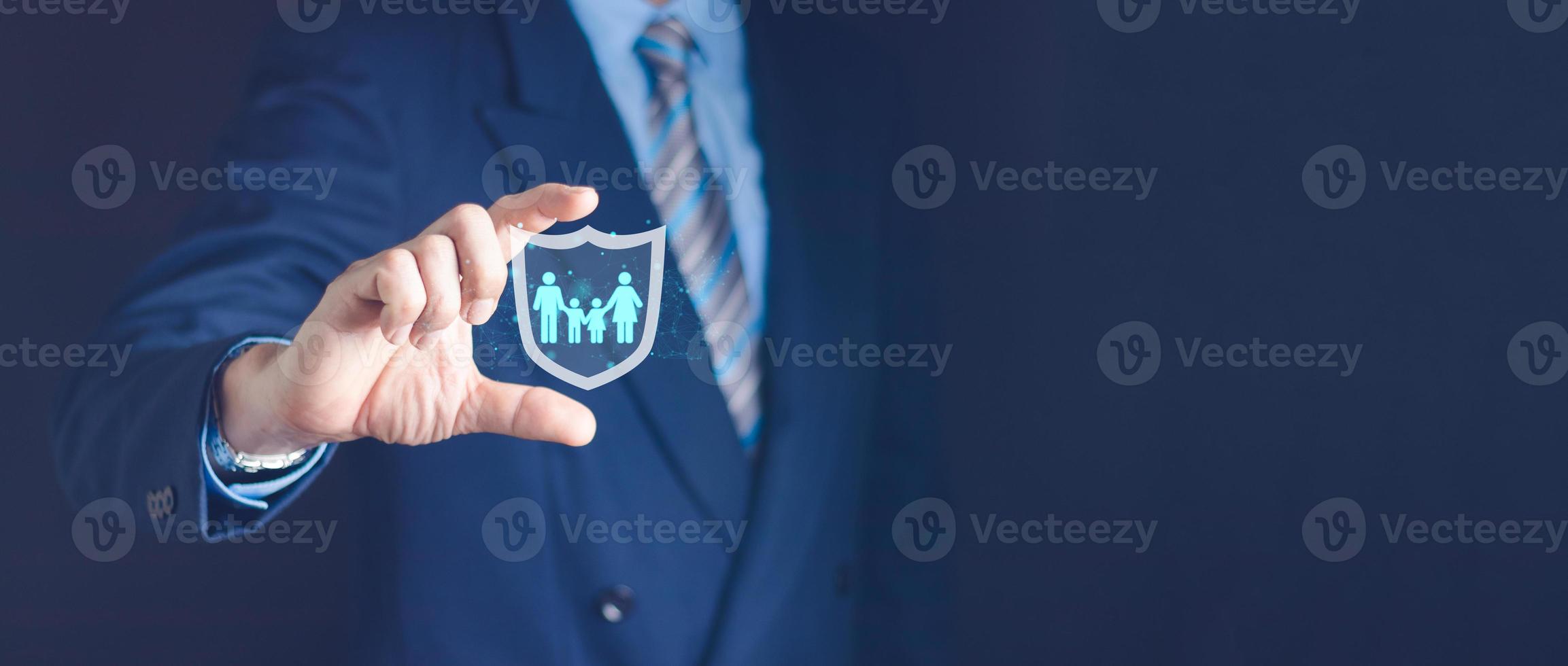 Businessman with protection gesture and family, life, health and home insurance icon. insurance concept family life insurance and policy concept photo