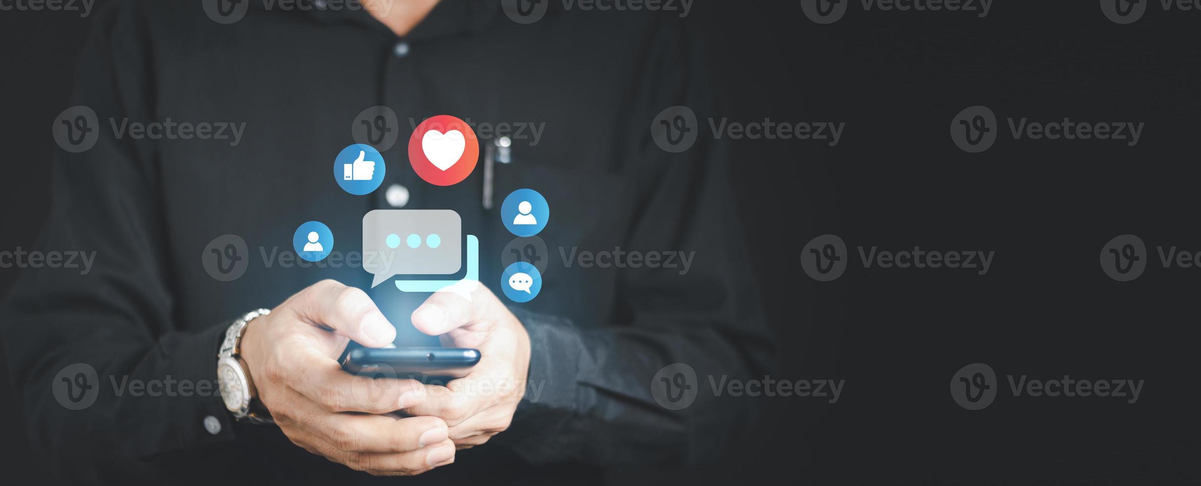 Social media and digital online concept, man using smart phone. The concept of living on vacation and playing social media. Social Distancing ,Working From Home concept. photo