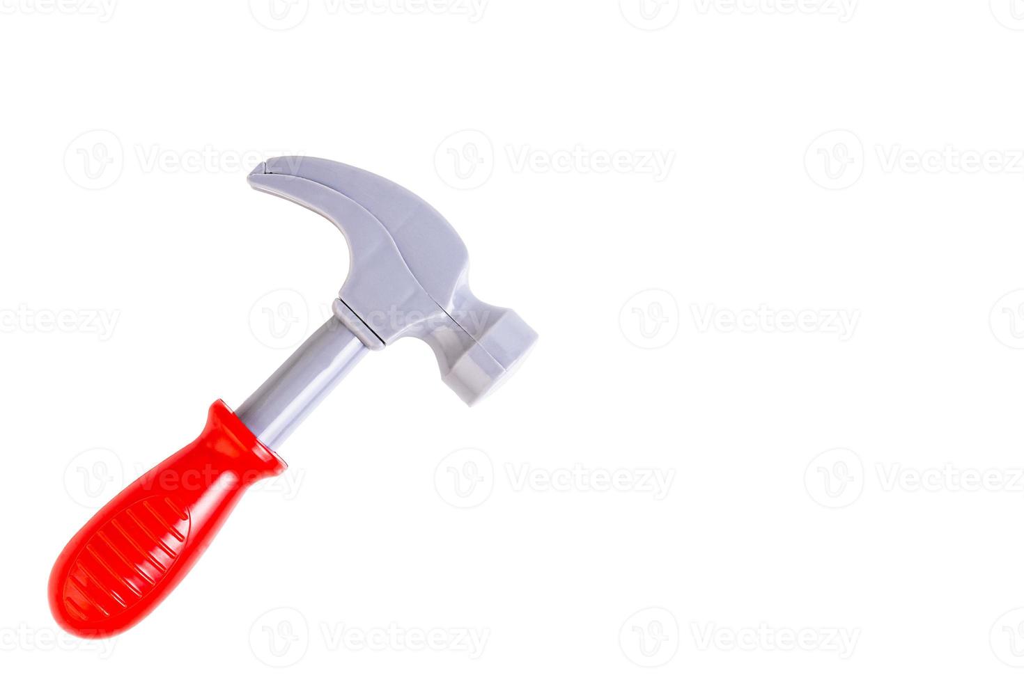 Hammer, a toy plastic hammer with a red handle, a children's tool. Isolated white background. photo