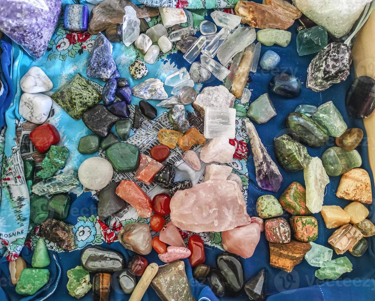 Multicolored energy Reiki stones photographed from above photo