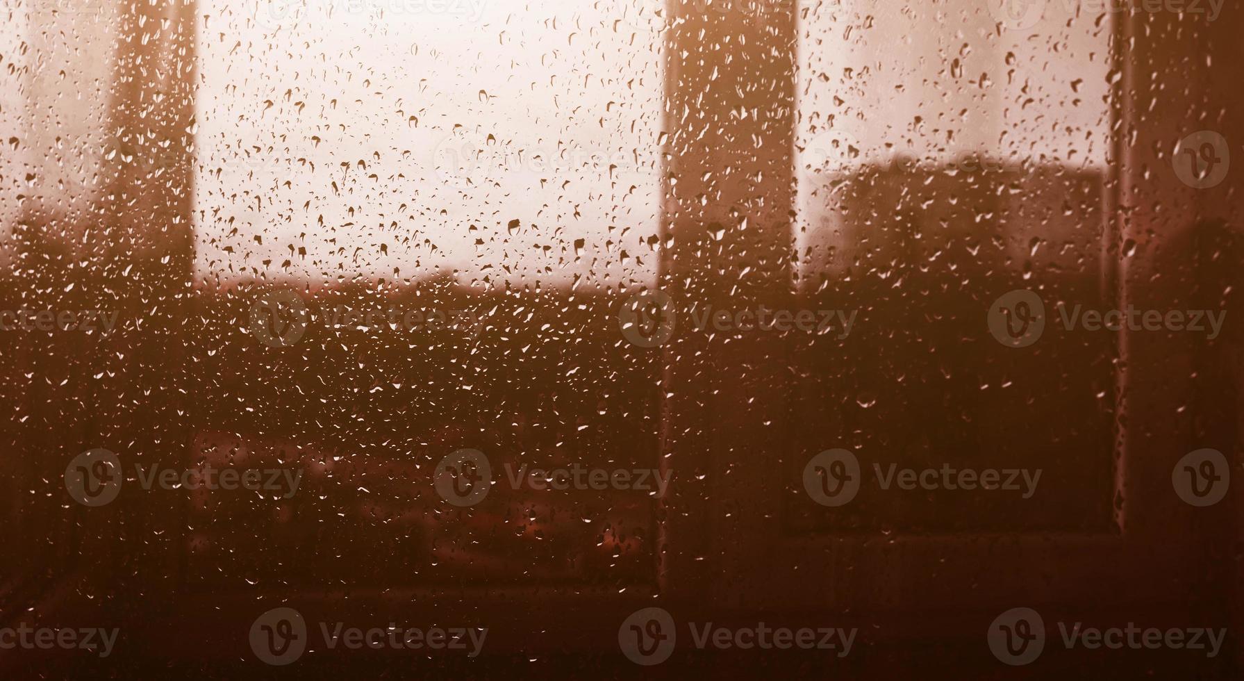 Raindrops on window's glass photo