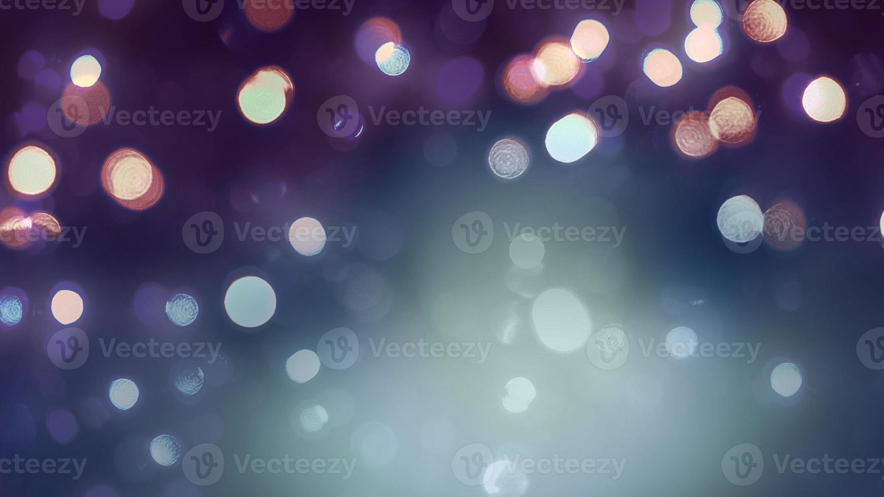 imagen compuesta de luces navideñas estilo bokeh contra un fondo púrpura. foto