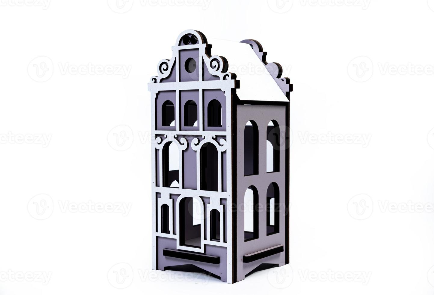 Houses symbol with metal key on white background. Real estate, insurance concept, mortgage, buy sell house, realtor concept, little cars, trees photo