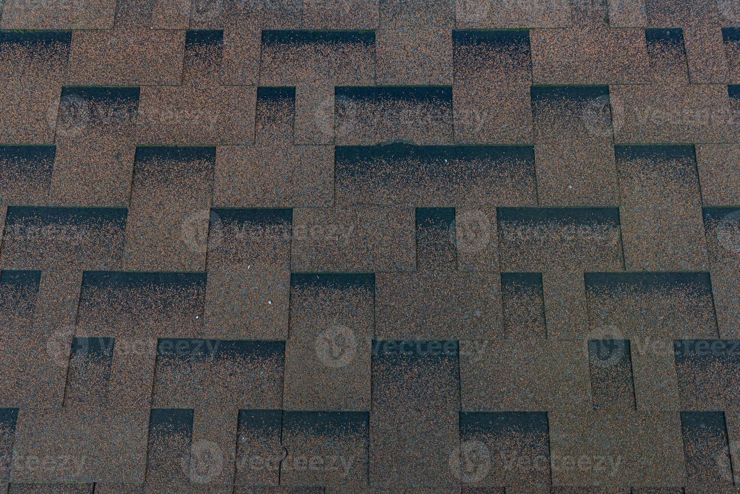 roof of new house with shingles roof-tiles, photo