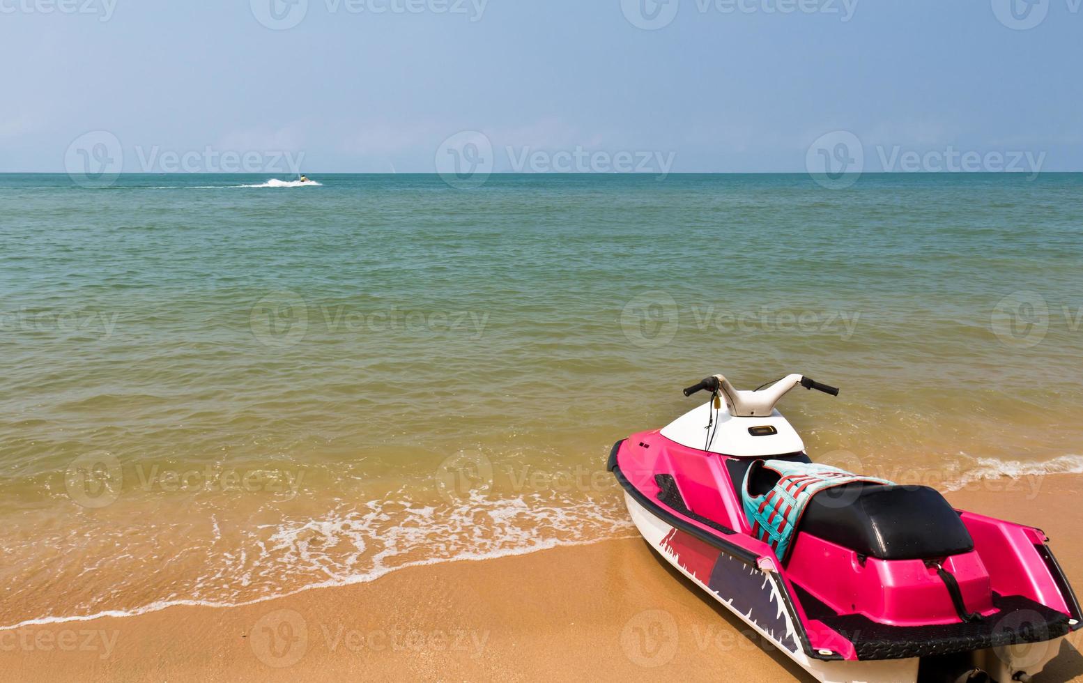 Water scooters on beach photo