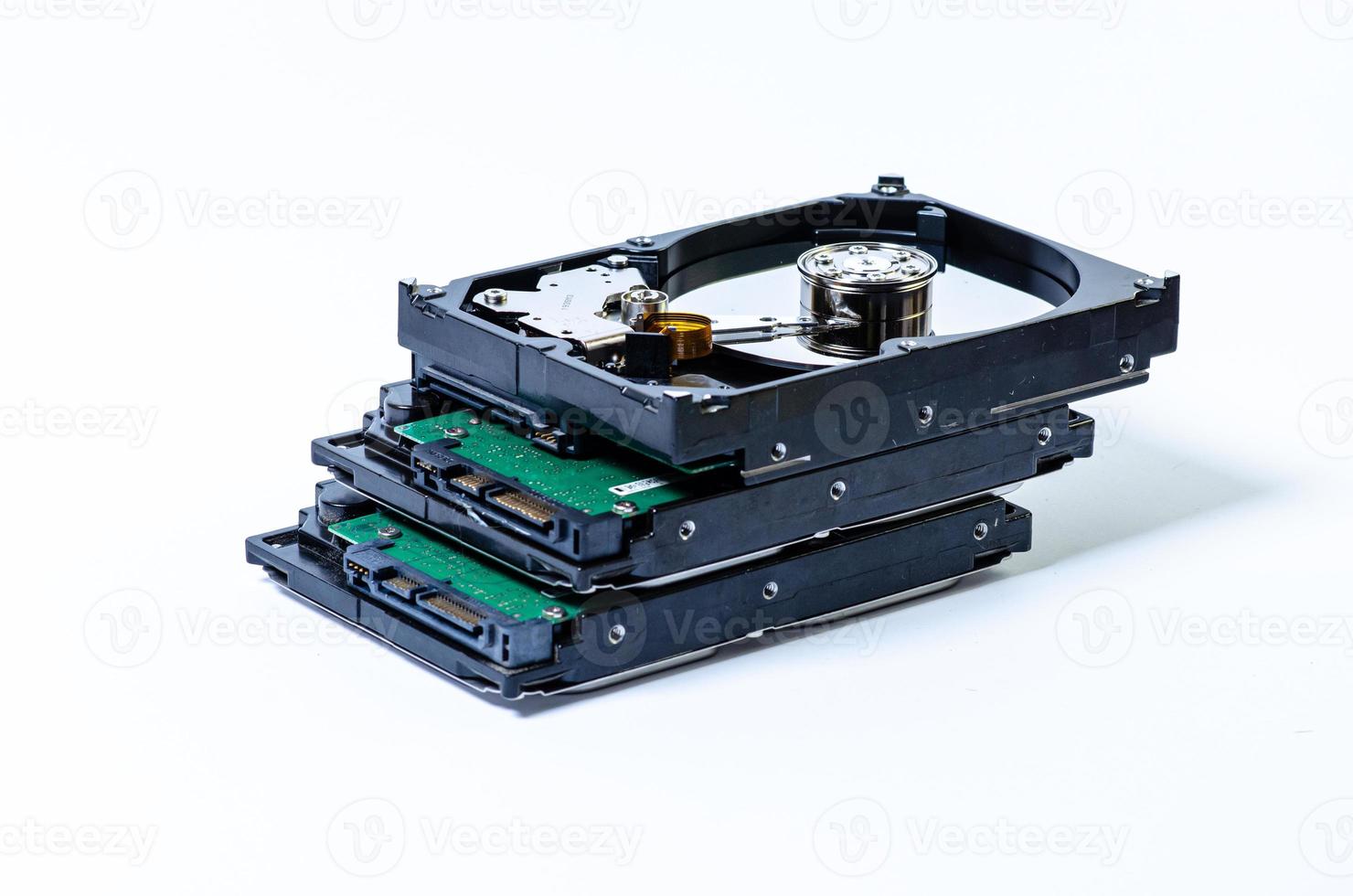 Hard disk drive HDD of different size isolated on white. photo