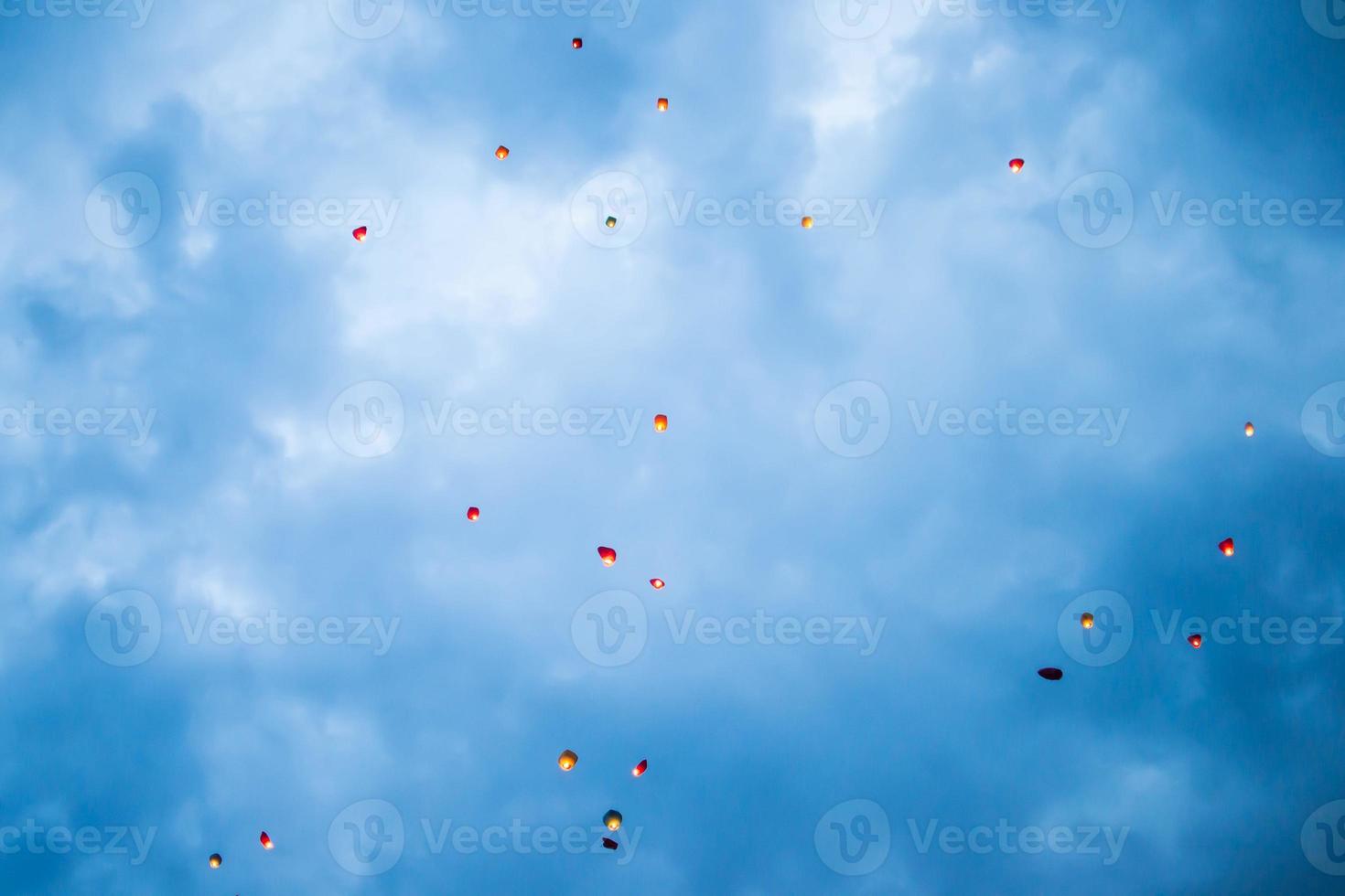 In the evening, at sunset, people with their relatives and friends launch traditional lanterns. photo