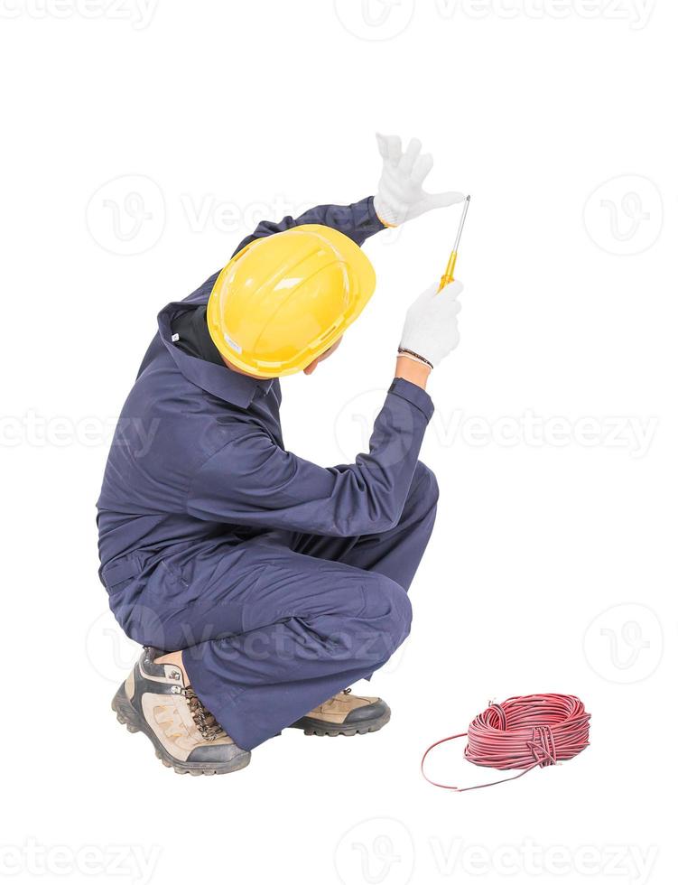 Electrician with bunch of wires invisible wall photo