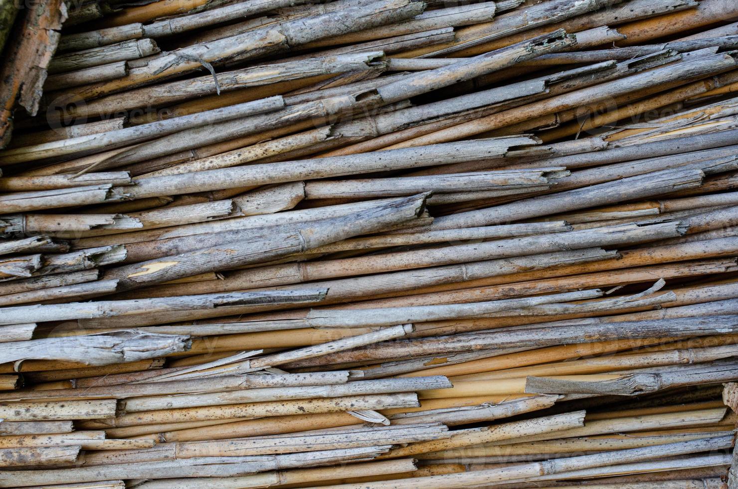 The thatched roof texture of an old house photo