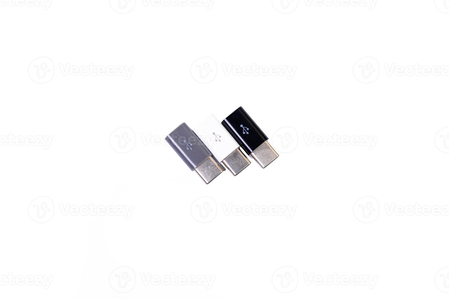 various converter cables adapters for computers and smartphones HDMI VGA USB DVI DP isolated on white photo