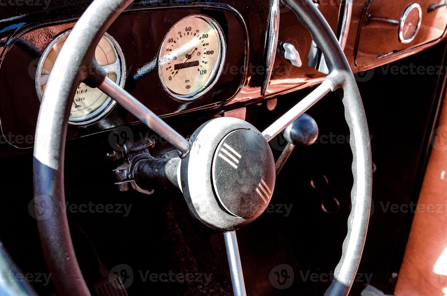 Color detail on the headlight of a vintage car photo