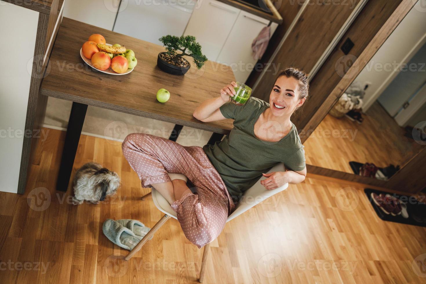 Woman About To Drink A Glass Of Smoothie photo