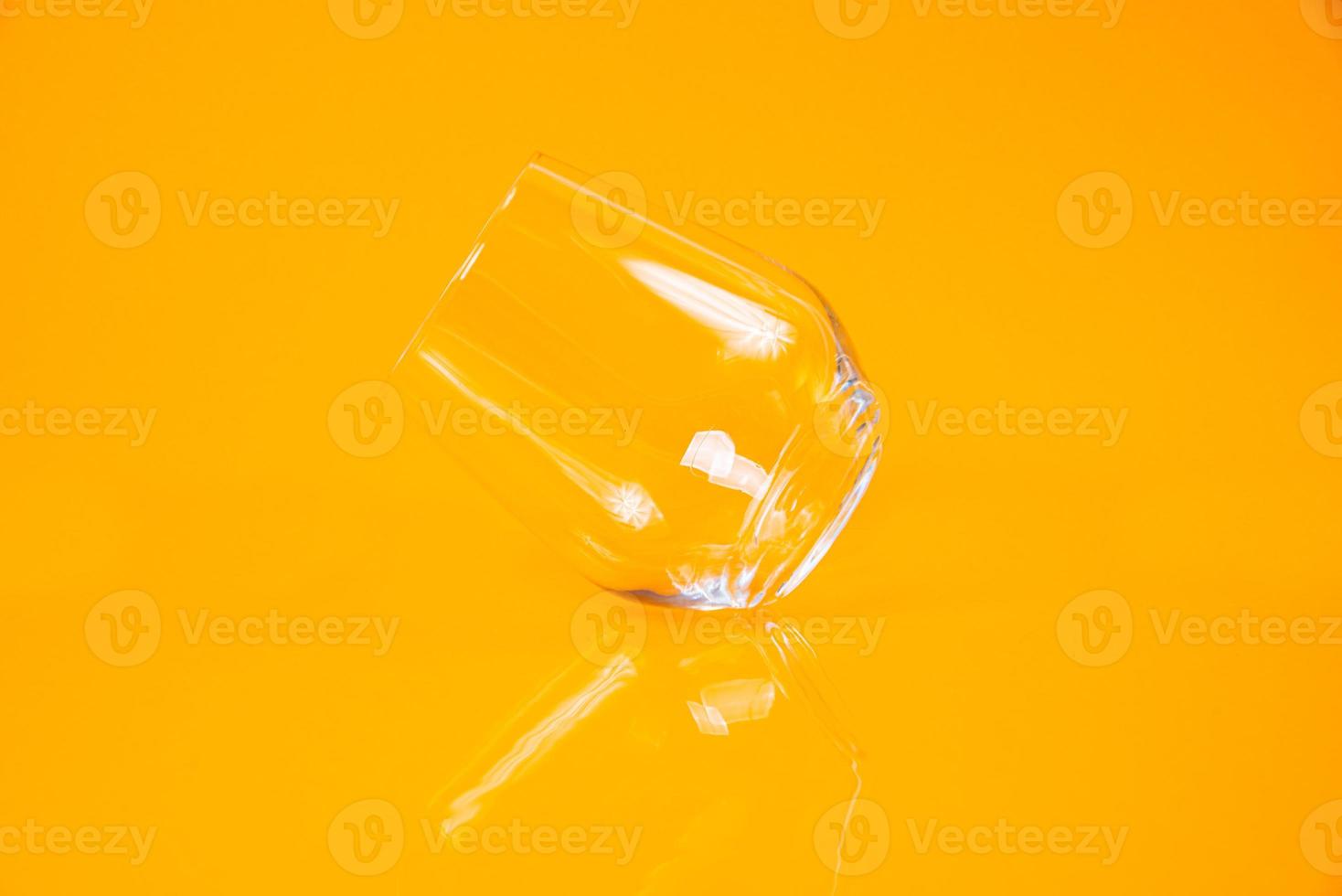 empty glass empty jar empty ice bucket on orange background photo