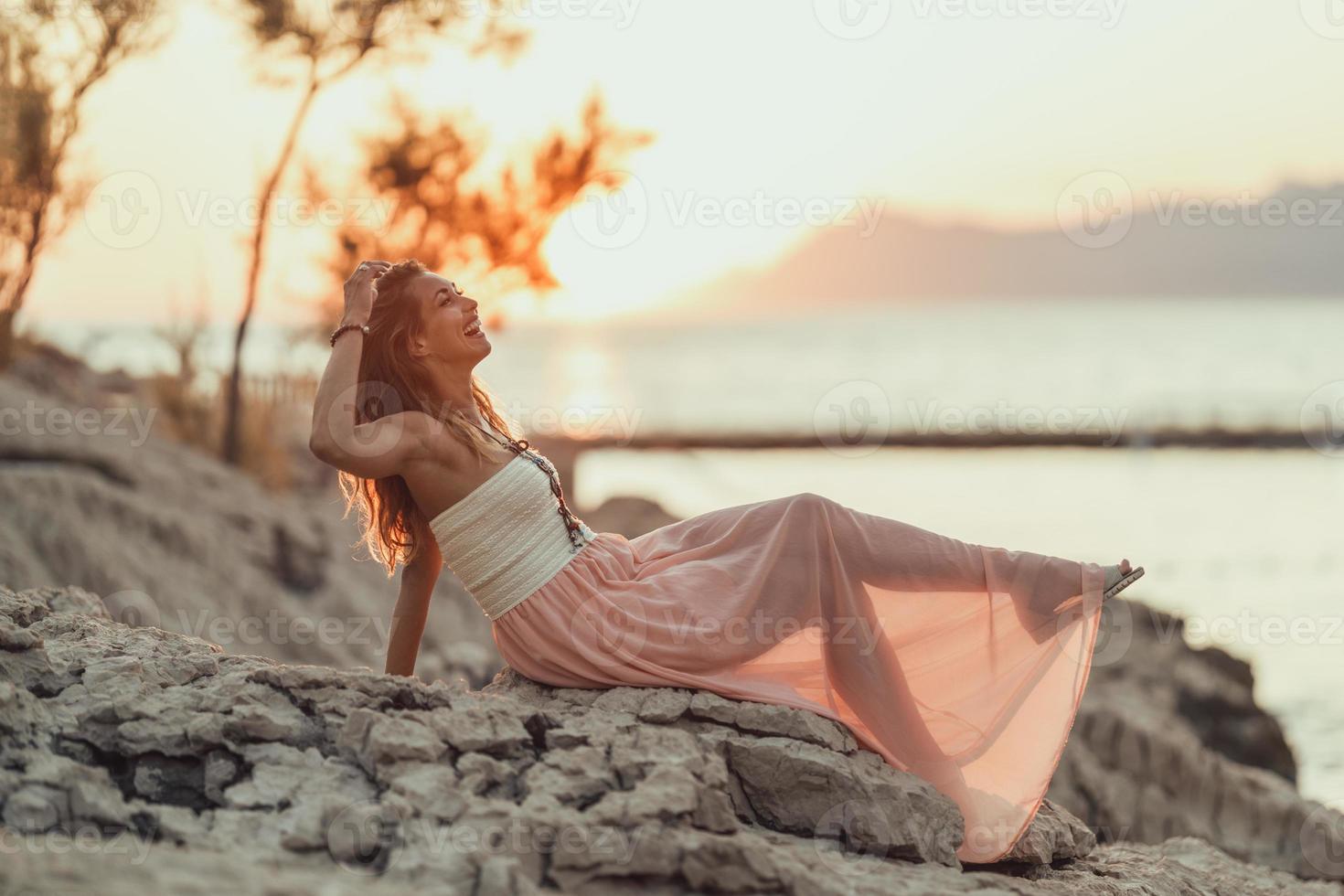 Woman Enjoying A Summer Vacation At The Beach photo