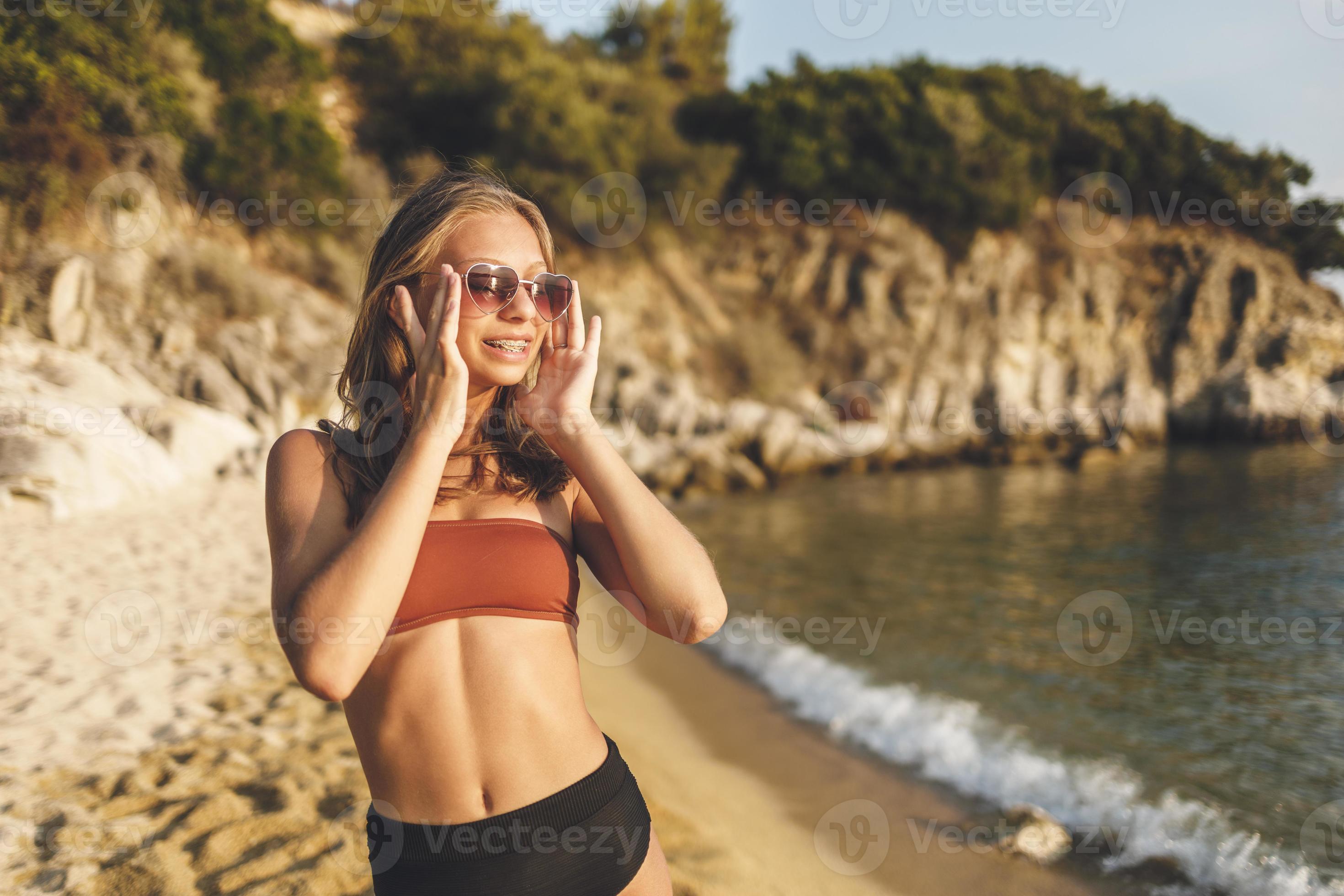 Teenager Girl Enjoying At The Beach 13880405 Stock Photo at Vecteezy