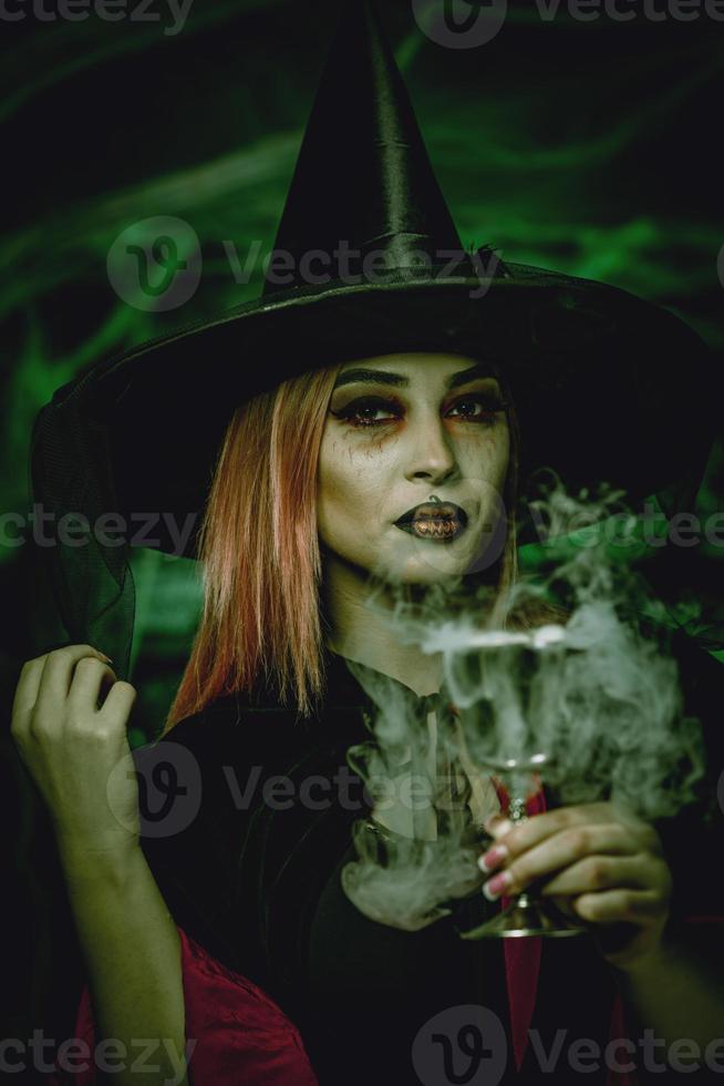 Witch Drinks Magic Potion photo