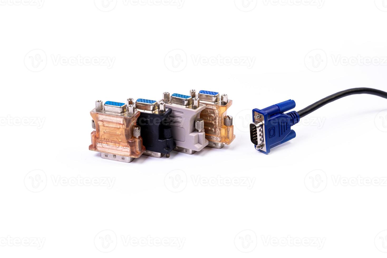 various converter cables adapters for computers and smartphones HDMI VGA USB DVI DP isolated on white photo