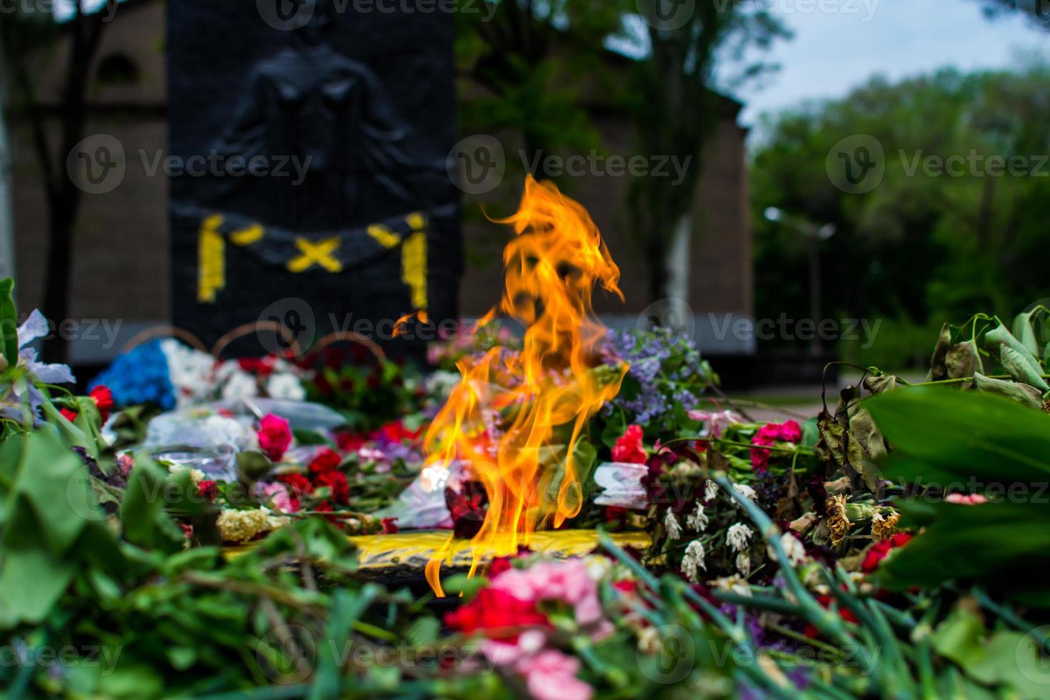 The flame of the eternal flame of the monument of the Second World War. A symbol of the solemn memory of the people about the fallen heroes. photo