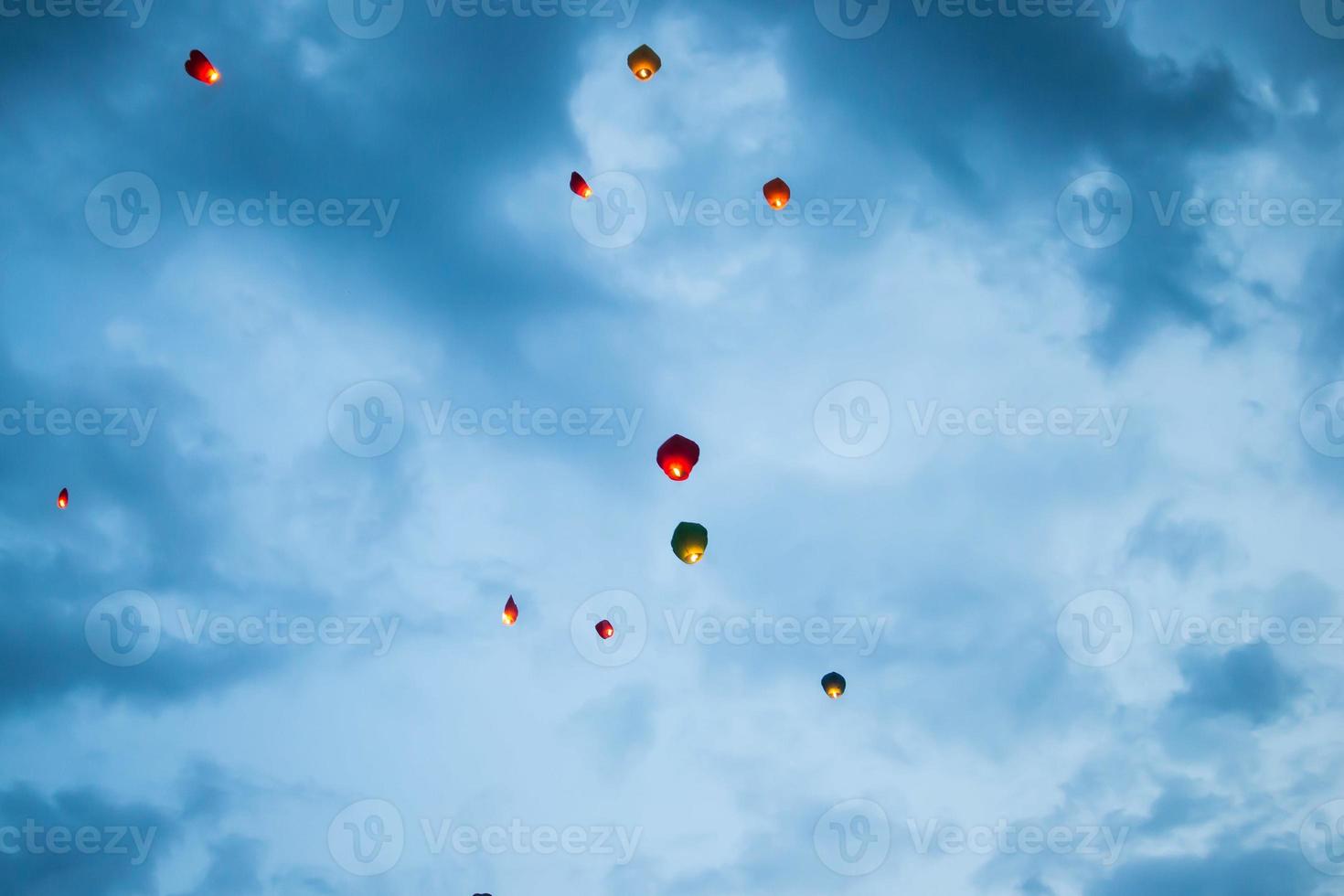 In the evening, at sunset, people with their relatives and friends launch traditional lanterns. photo