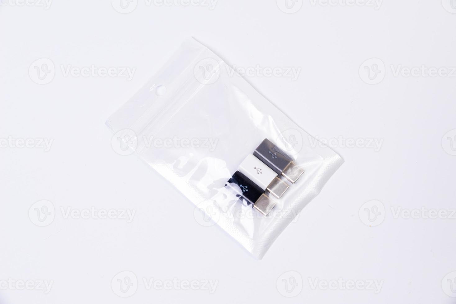 various converter cables adapters for computers and smartphones HDMI VGA USB DVI DP isolated on white photo