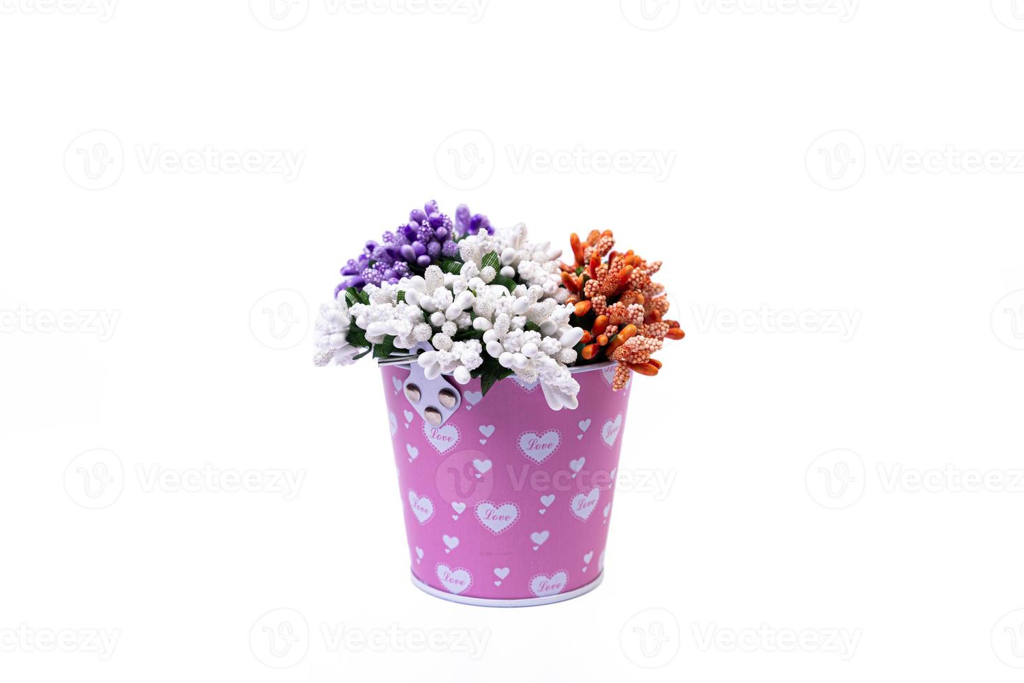 aluminum ice bucket laid in wait for use. stainless multi-colored bucket with green blue flowers photo