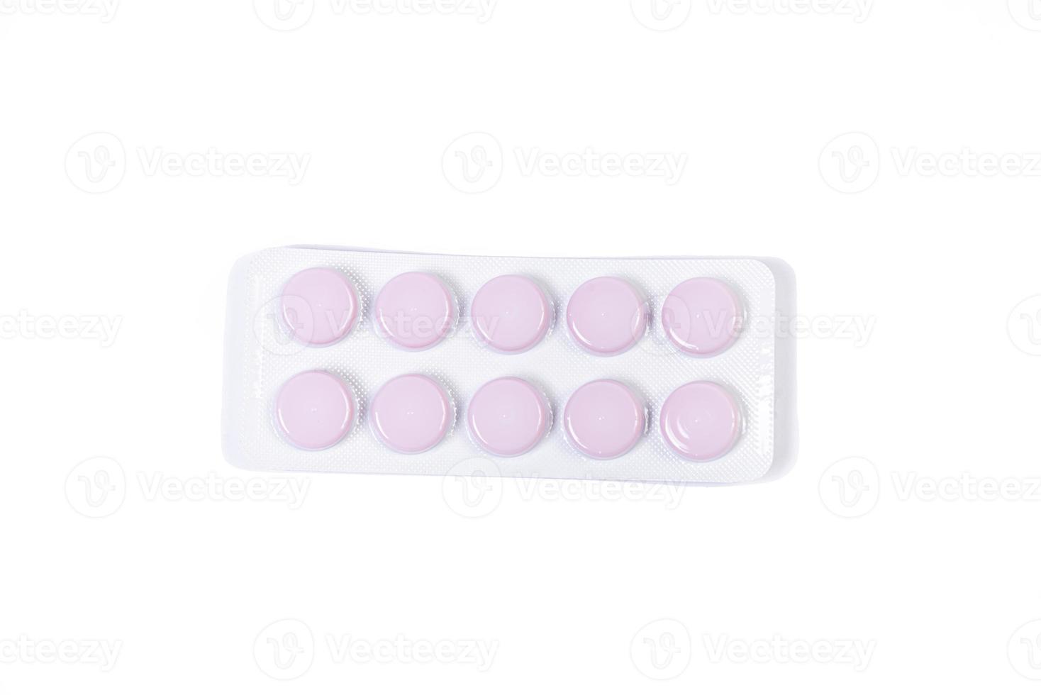 Medical pill blister on isolated white background with reflection photo