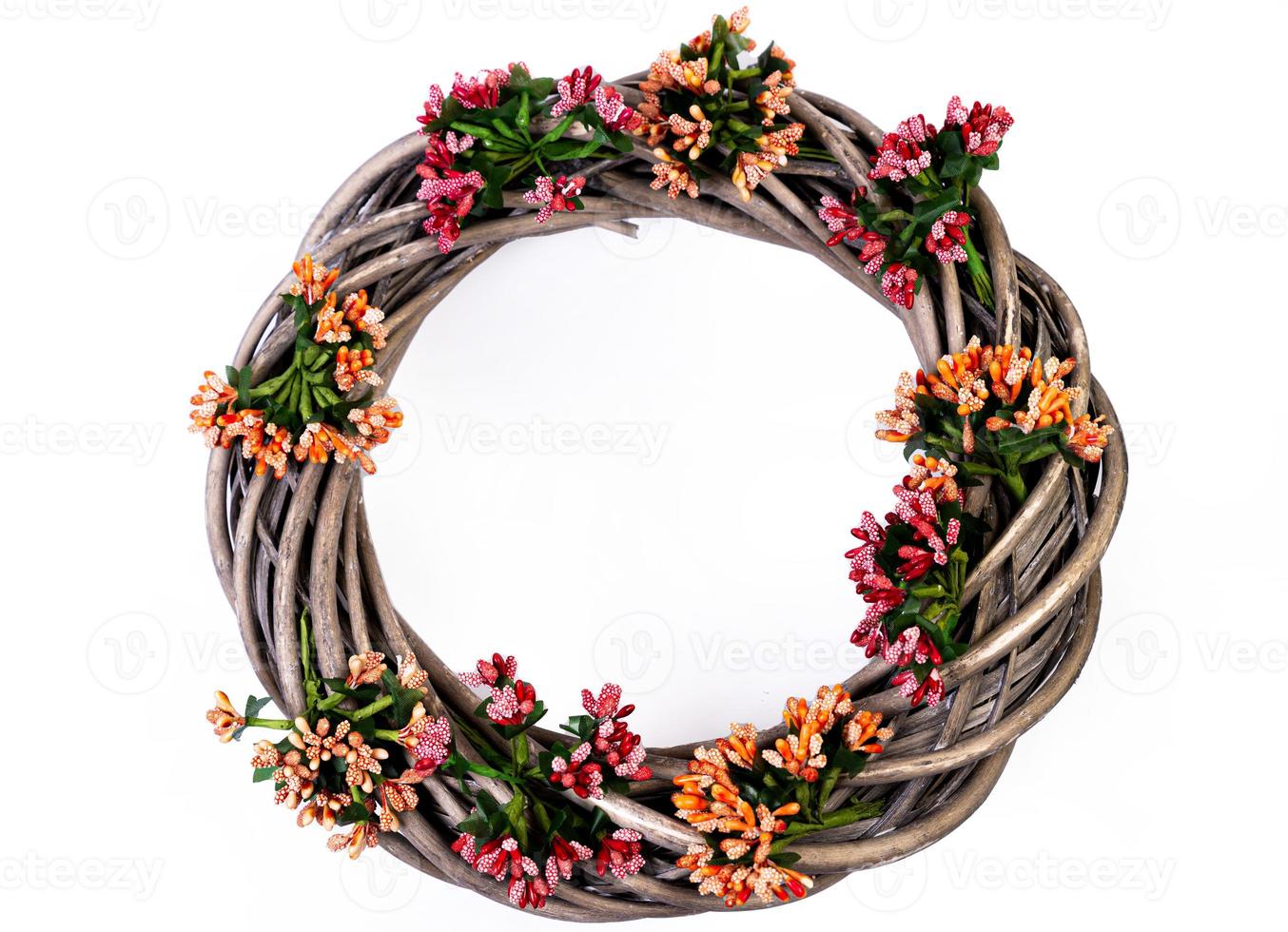 Wreath woven from the branches of the vine isolated , Place for text photo