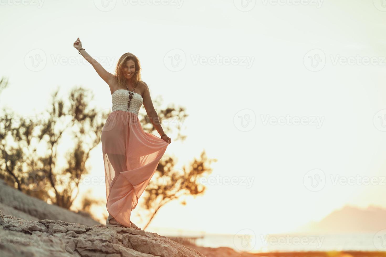 Woman Enjoying A Summer Vacation At The Beach photo