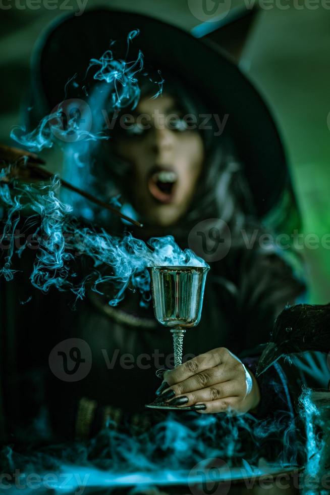 Witch Drinks Magic Potion photo