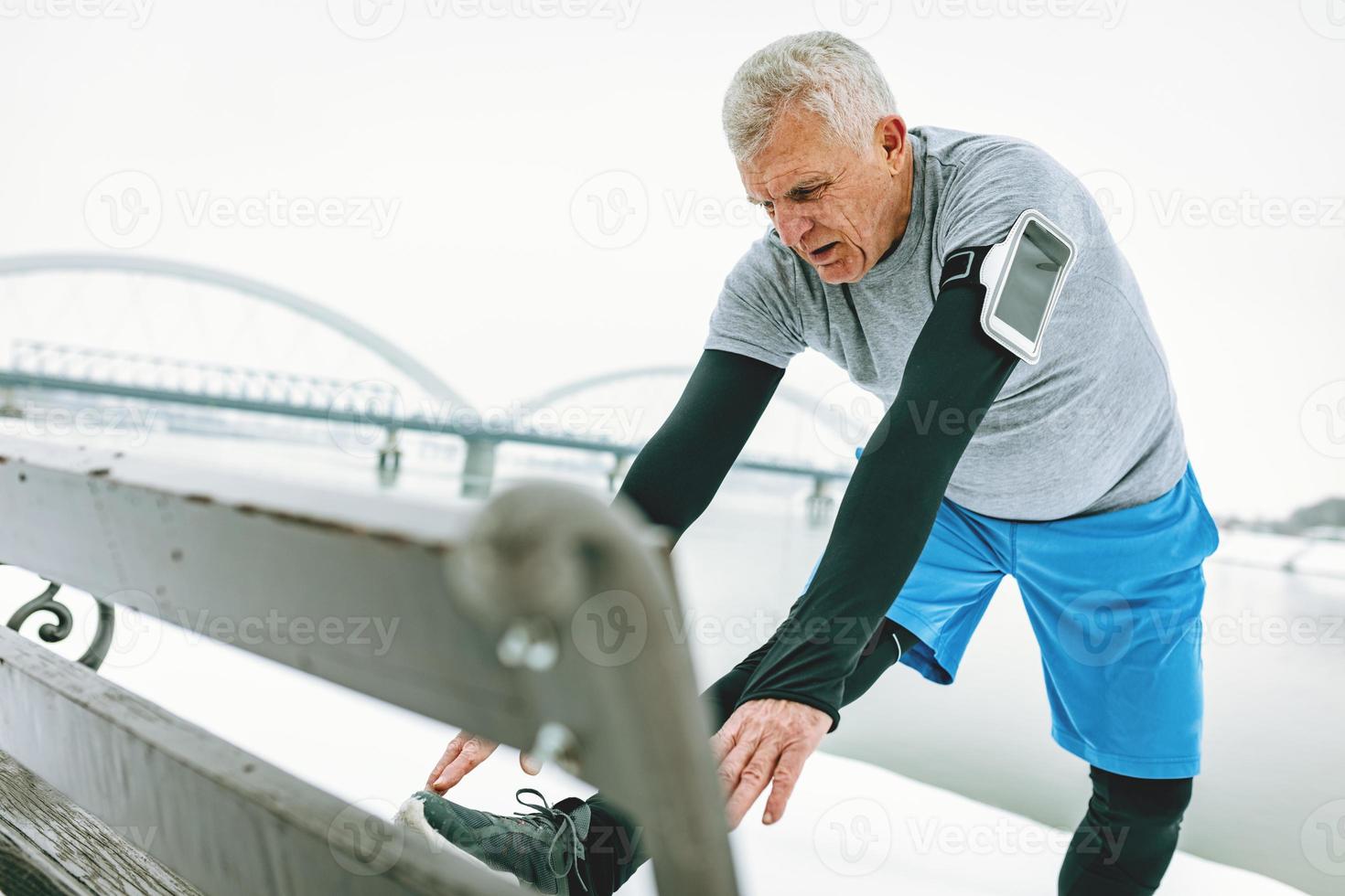 Stretching On The Bench photo