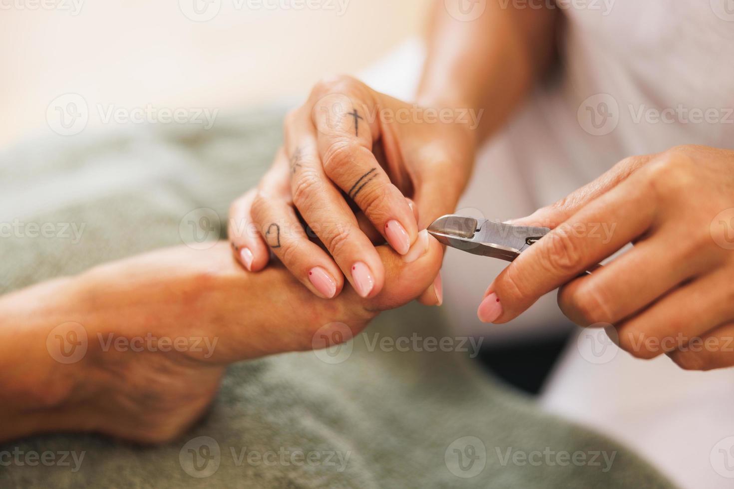 Woman Enjoying Pedicure Treatment At A Beauty Salon photo