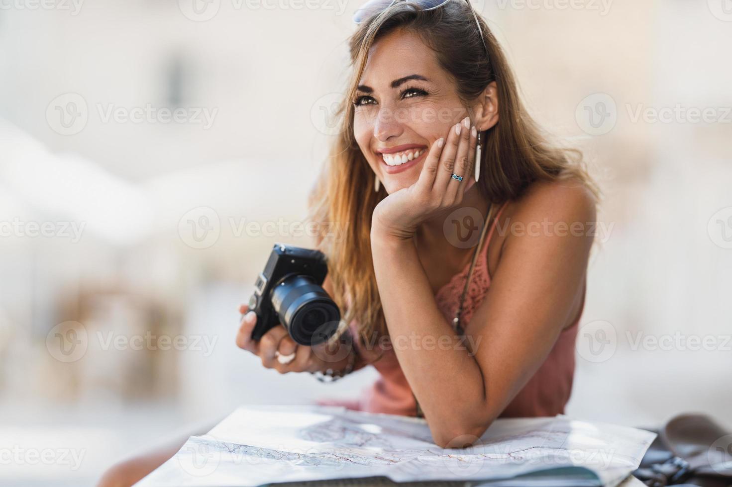 Woman with camera photo