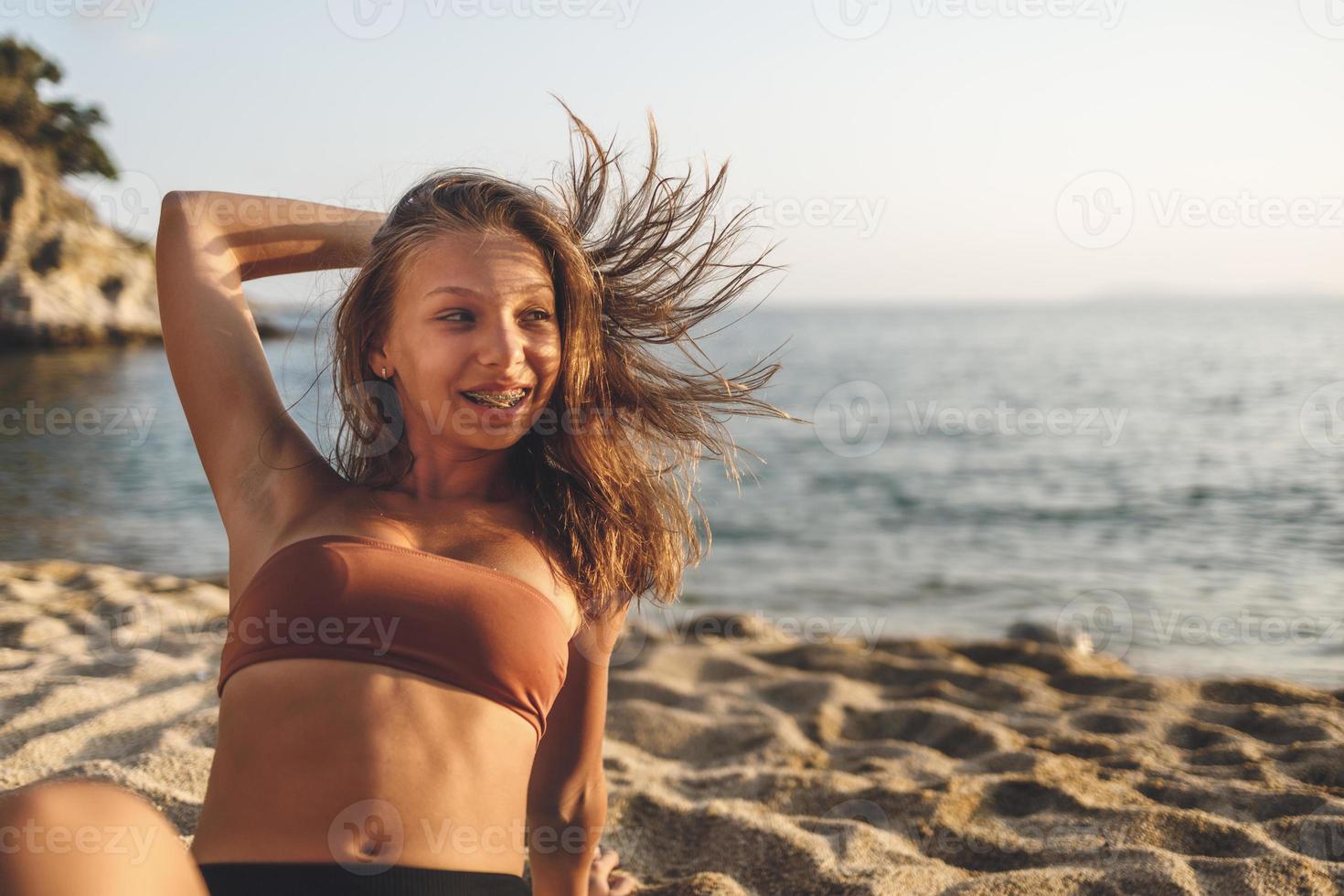 Teenager Girl Enjoying At The Beach 13880405 Stock Photo at Vecteezy