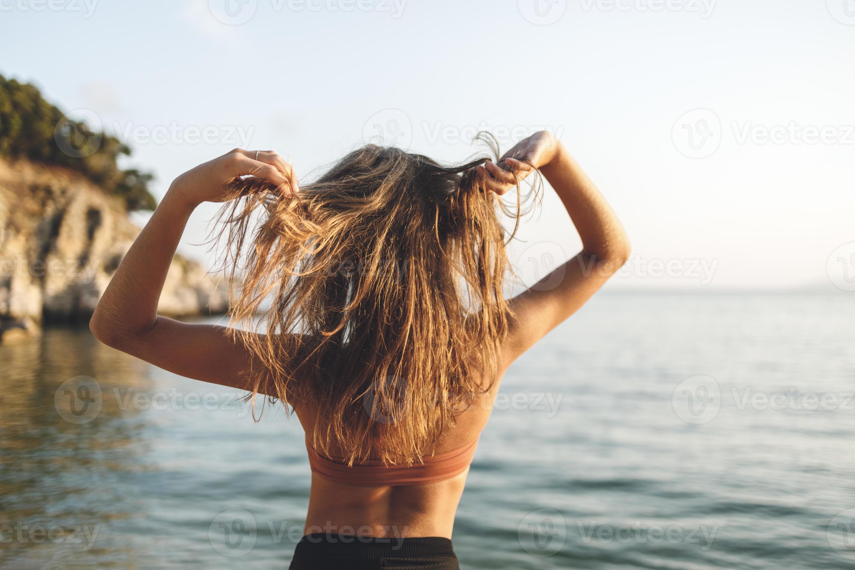 Teenager Girl Enjoying At The Beach 13880405 Stock Photo at Vecteezy