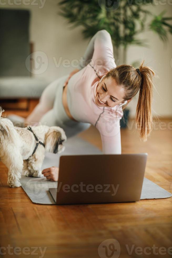 Perfecting Her Form With Some Helpful Online Tutorials photo