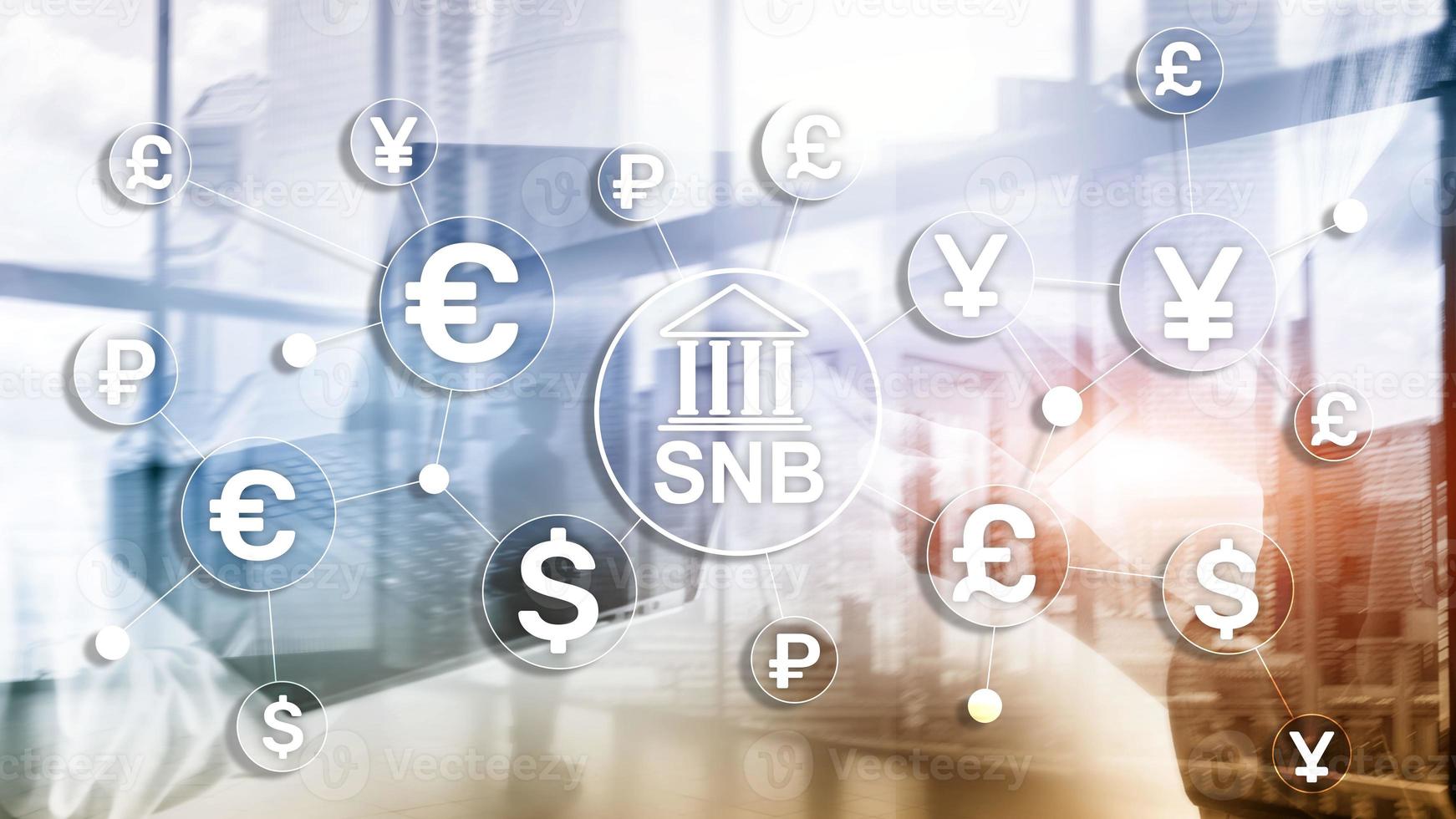 Different currencies on a virtual screen. SNB. Swiss National Bank. photo