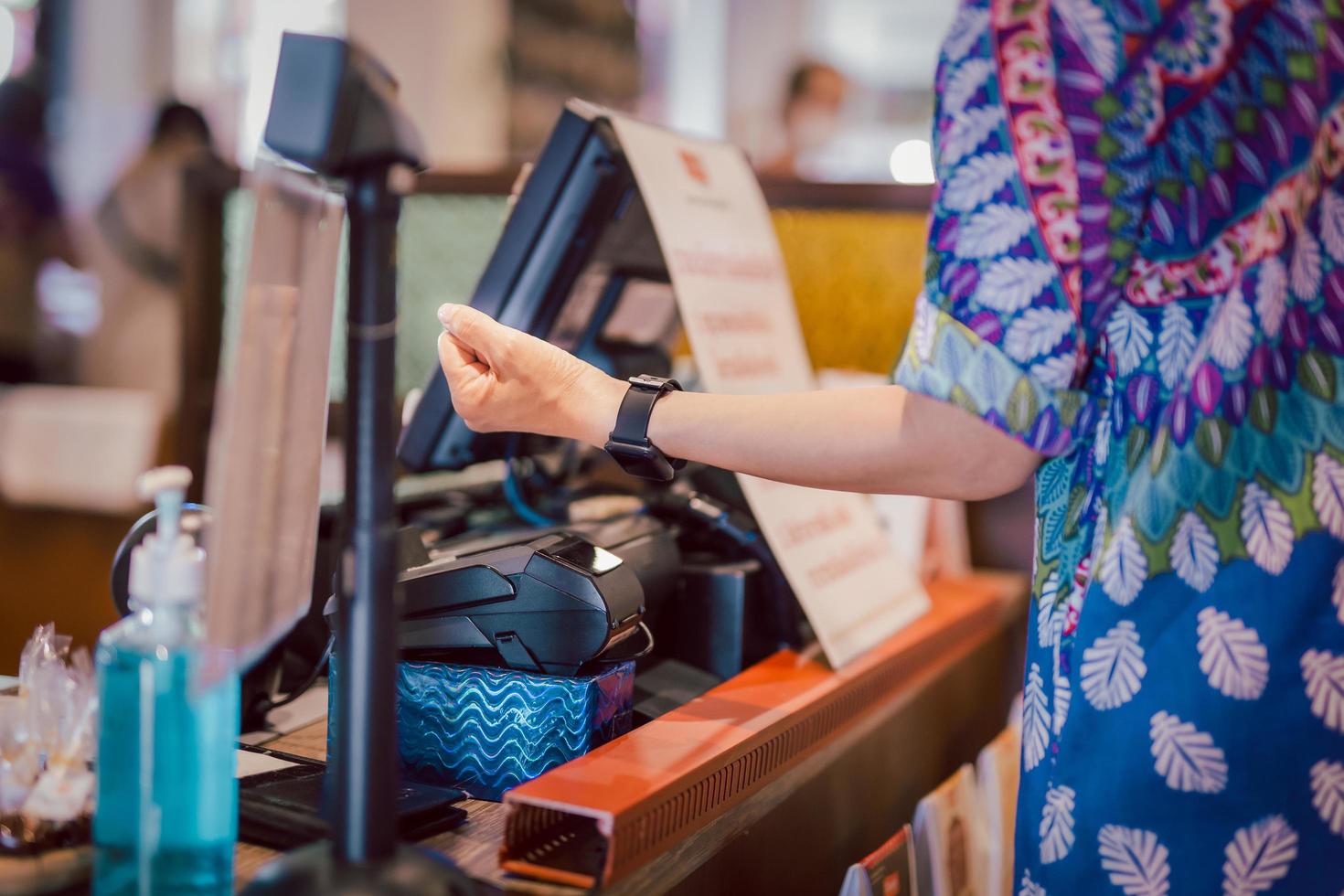 Customer payment smart wallet via smart watch terminal. photo
