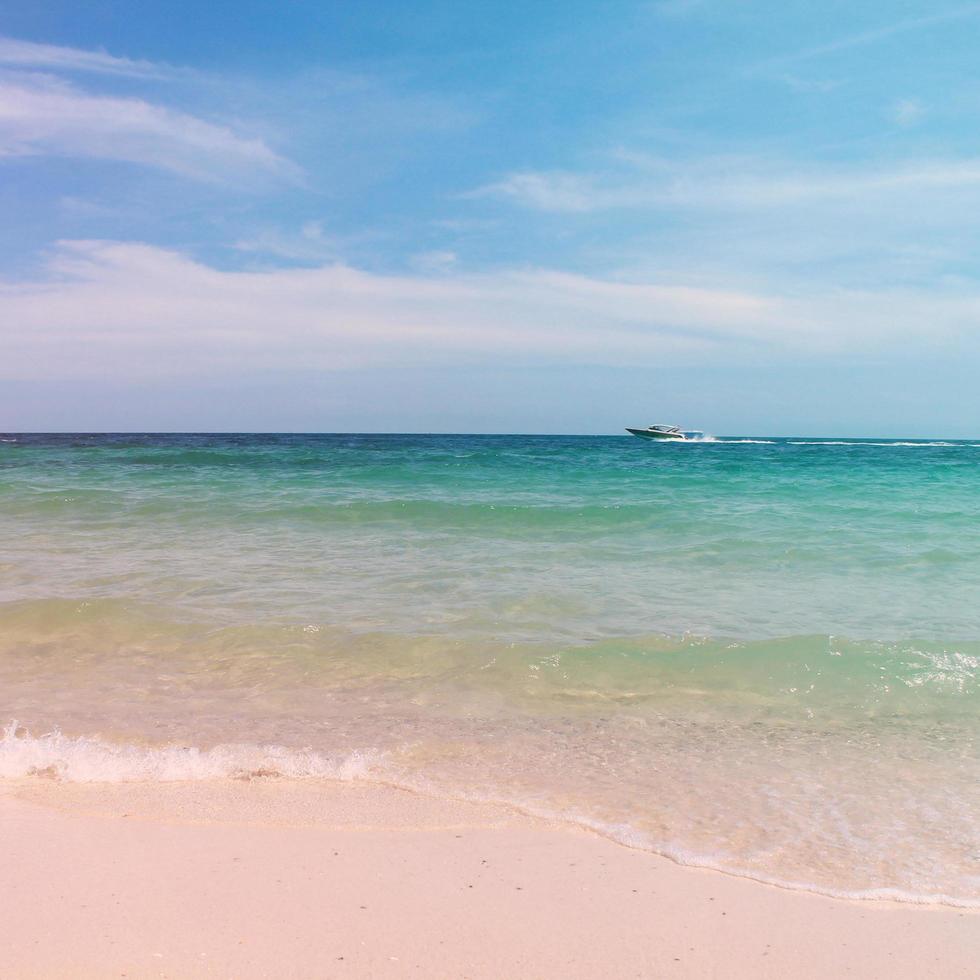 summer beach sea view and boat with retro filter style photo