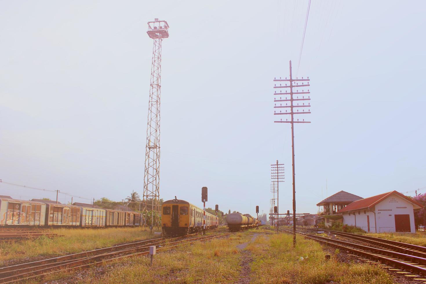 Old railway station with retro filter effect photo