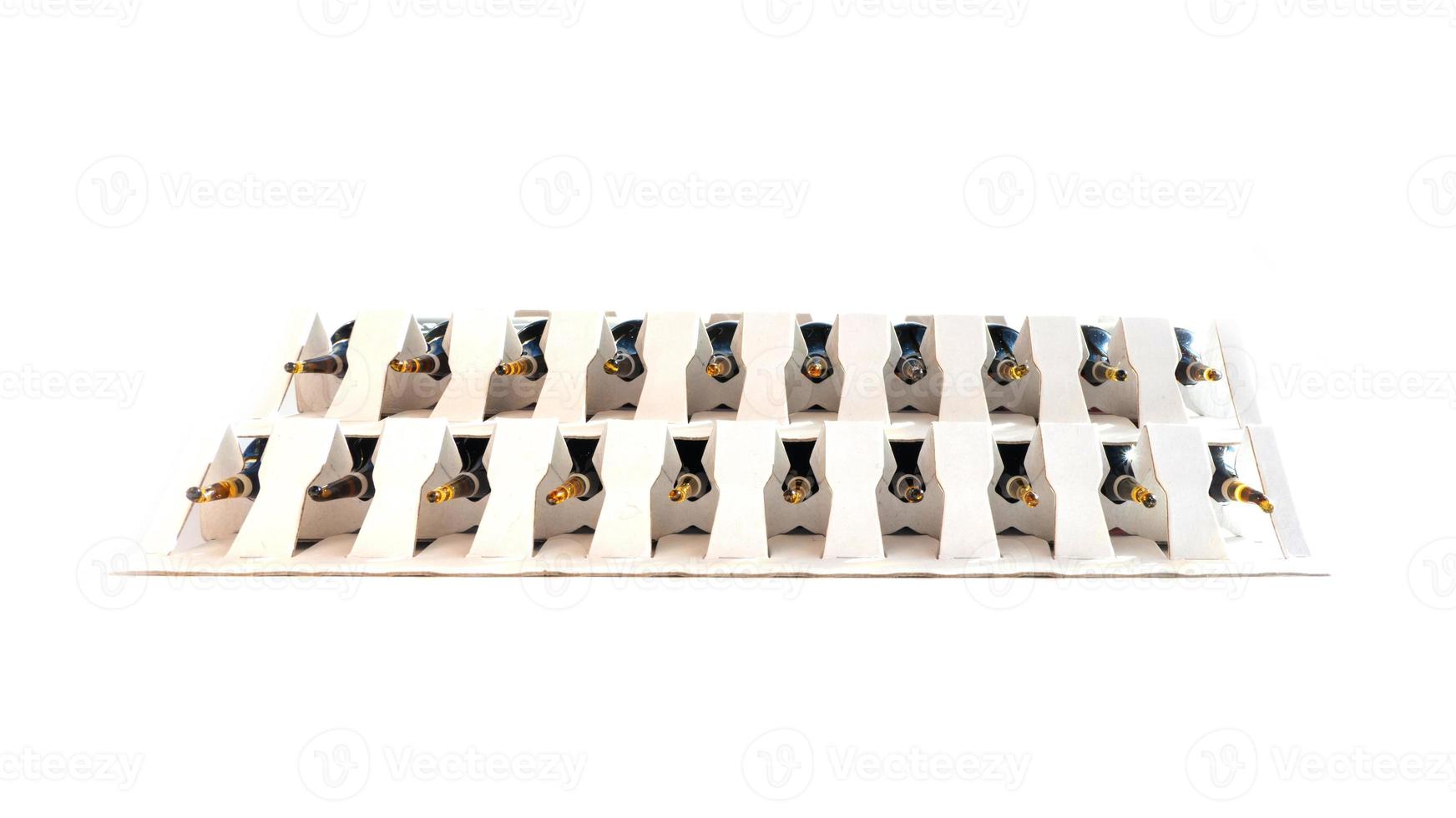 Group of ampoules with a transparent medicine in medical laboratory. lot of ampoules on light background. photo