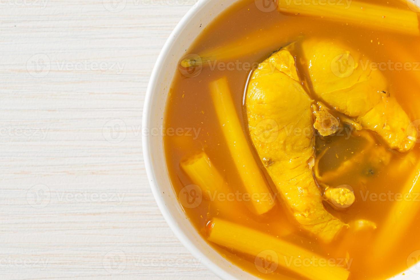 Sour soup with lotus stem and fish photo