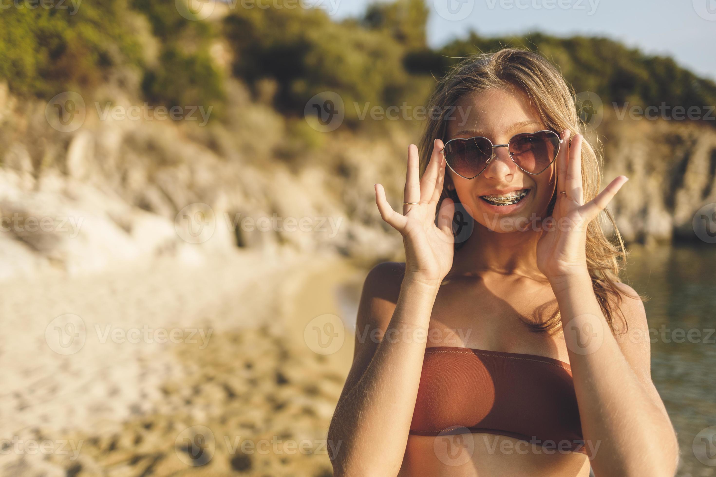 Teenager Girl Enjoying At The Beach 13880405 Stock Photo at Vecteezy