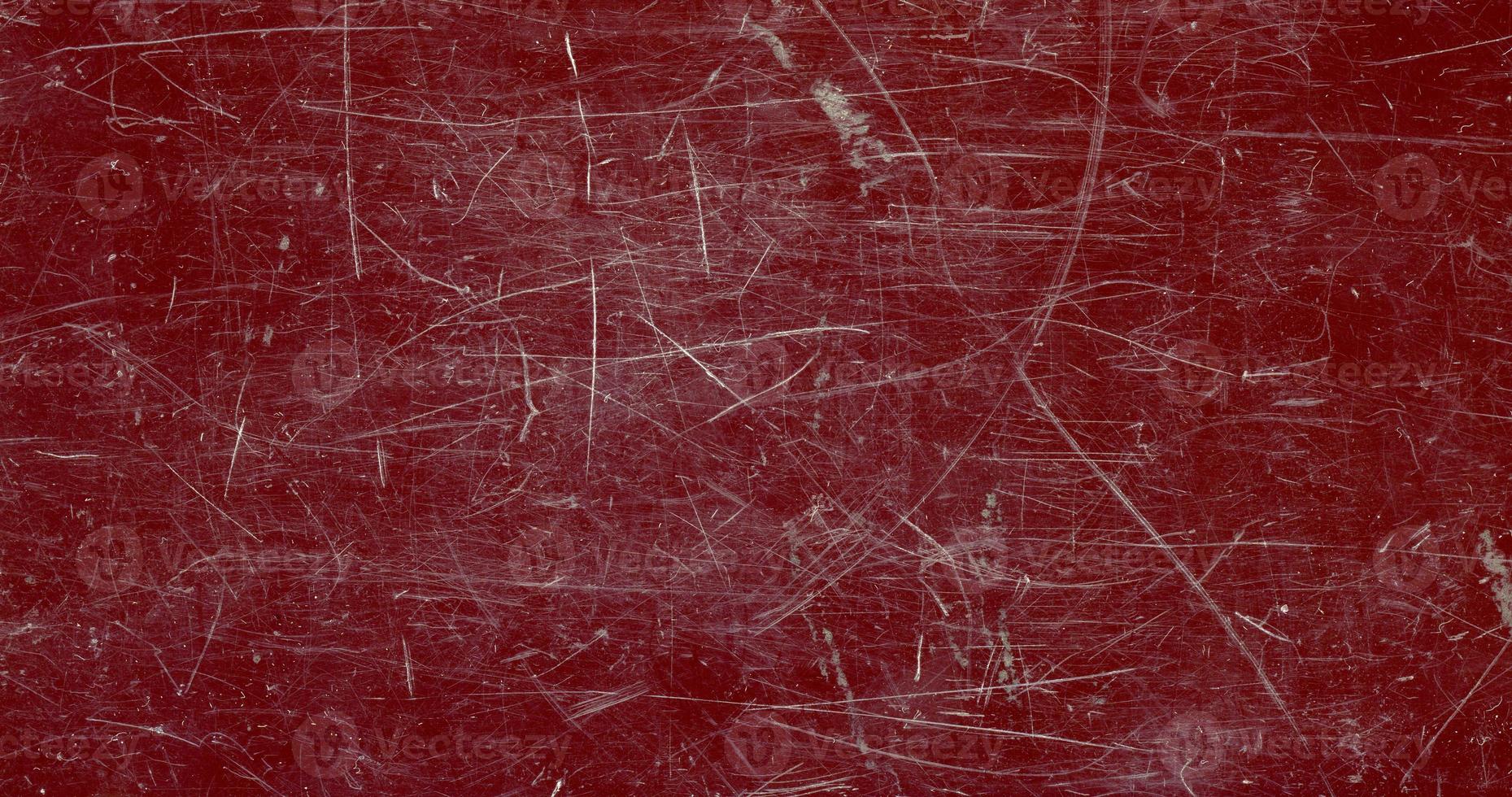 scratched brown red plastic texture background photo