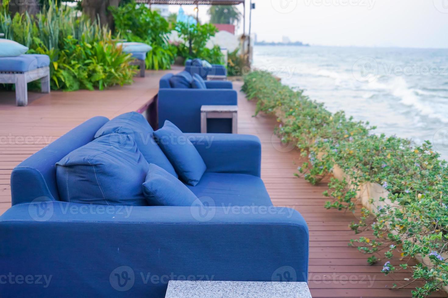 outdoor sofa with sea beach view photo